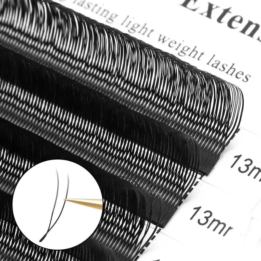 Black individual eyelash extension strips on a labeled tray, featuring a close-up of a Y-shaped lash cluster.