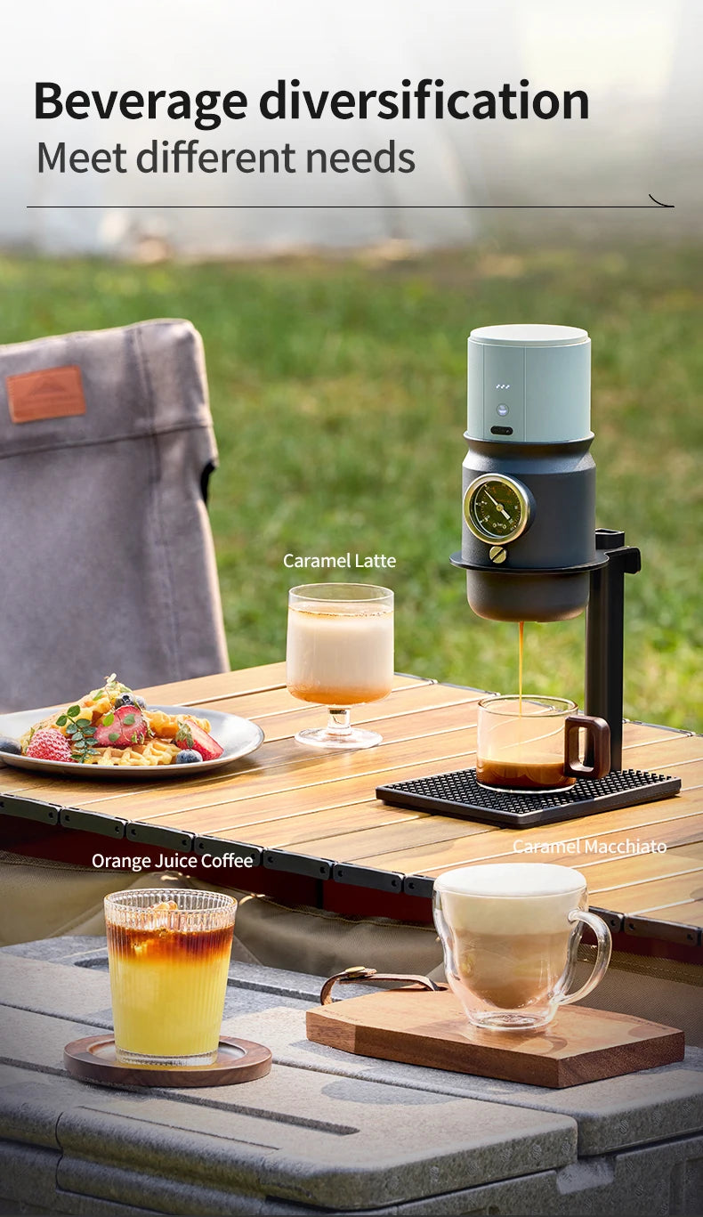 Compact portable espresso maker in sage green and black with built-in pressure gauge for outdoor coffee brewing.