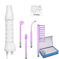 High frequency facial wand with white handle and four purple neon glass electrodes, including a comb, and UK plug.