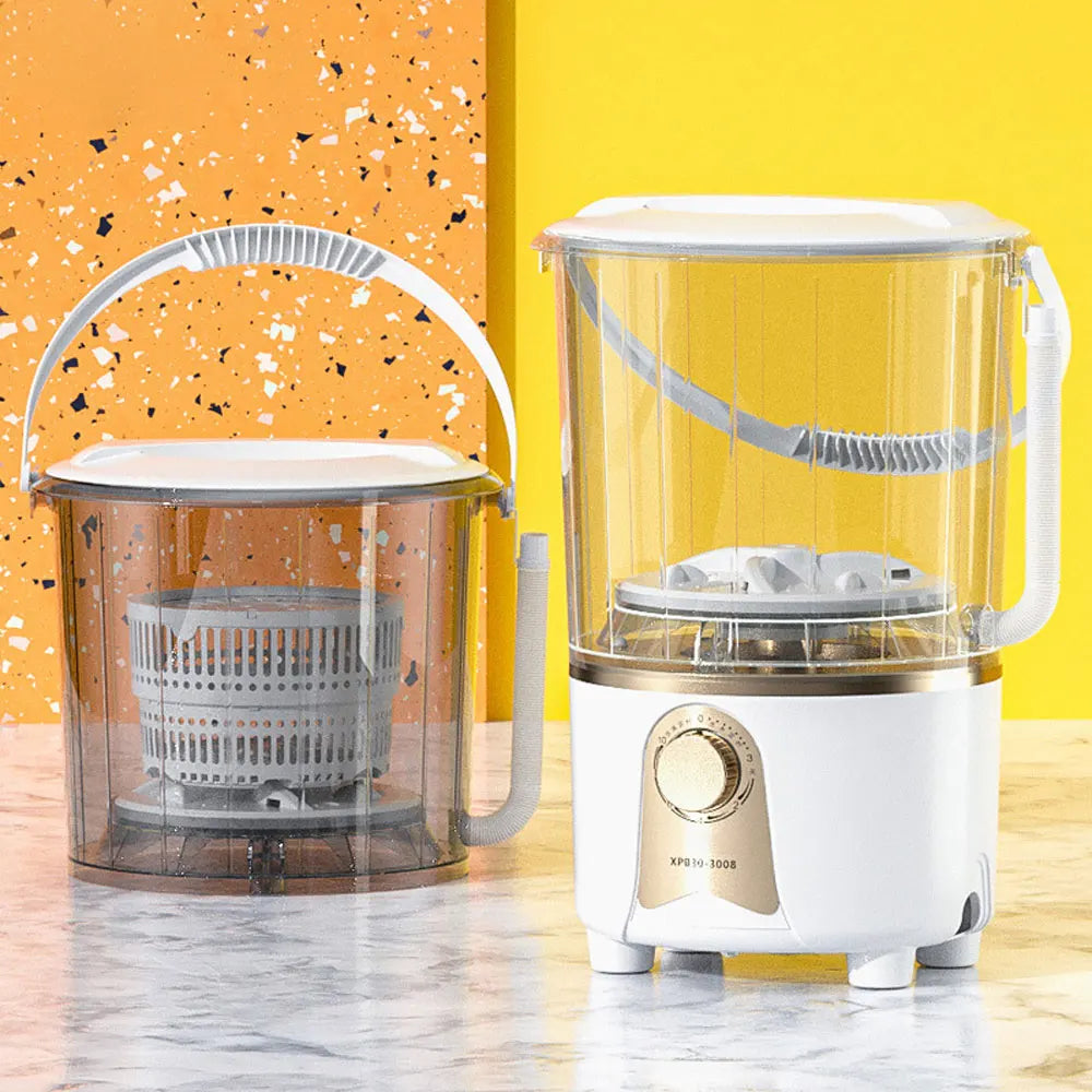 Portable automatic shoe washing machine with clear drum and white base on wet surface