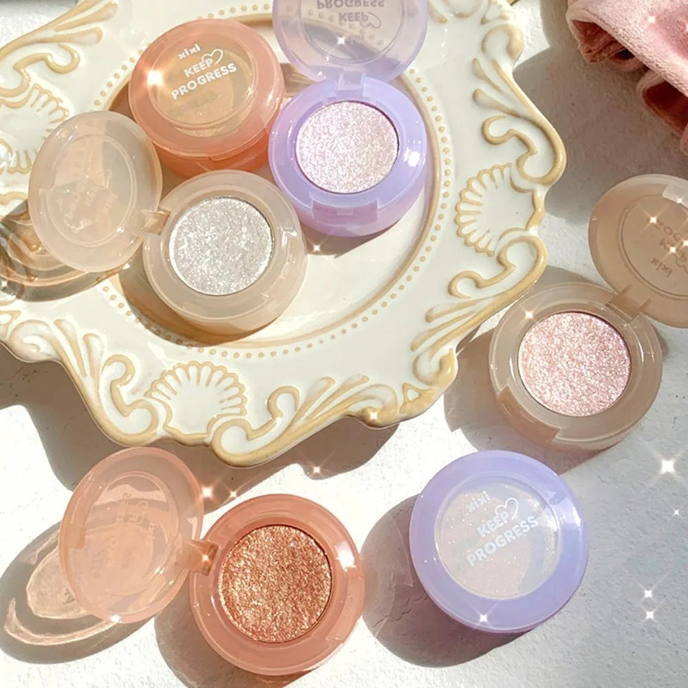 Tidesmit monochrome glitter eyeshadow and shimmering highlighter powder texture close-up for waterproof face makeup