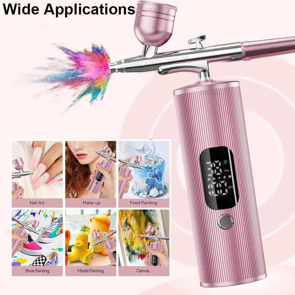Portable pink handheld airbrush kit with compressor for nail art, makeup, cake painting, and hobby models.