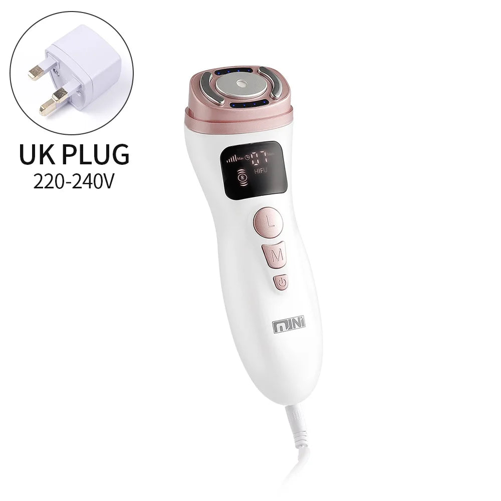 White and rose gold handheld HIFU facial massager with digital display, buttons, and an included UK plug adapter.