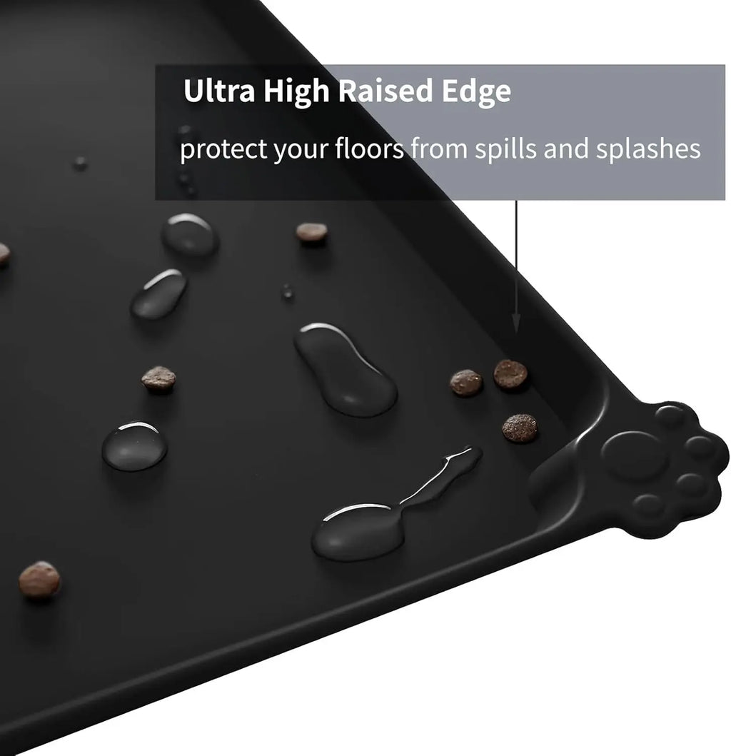 Black waterproof silicone pet feeding mat with raised edges to catch food spills and water for dogs and cats.