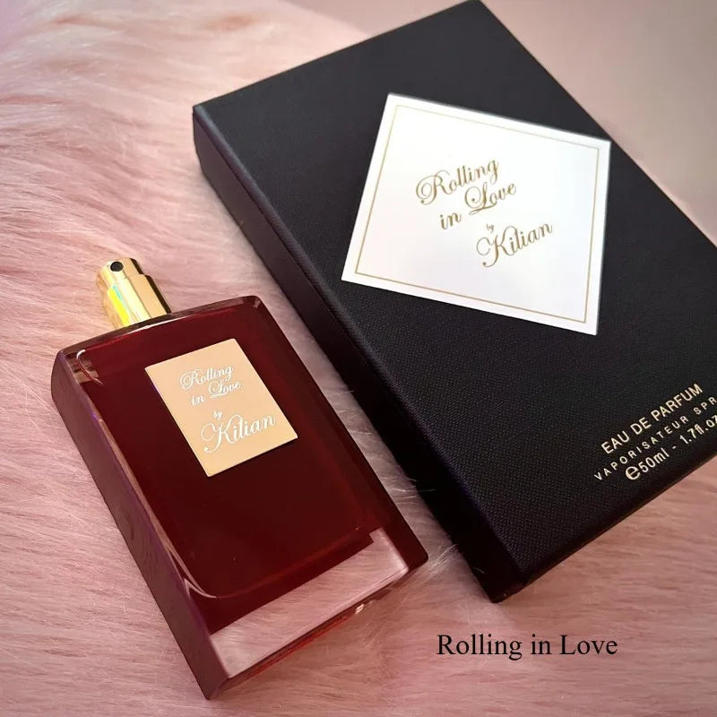 Kilian Rolling in Love unisex EDP 50ml. Red rectangular bottle, luxury floral oriental niche fragrance, spray perfume.