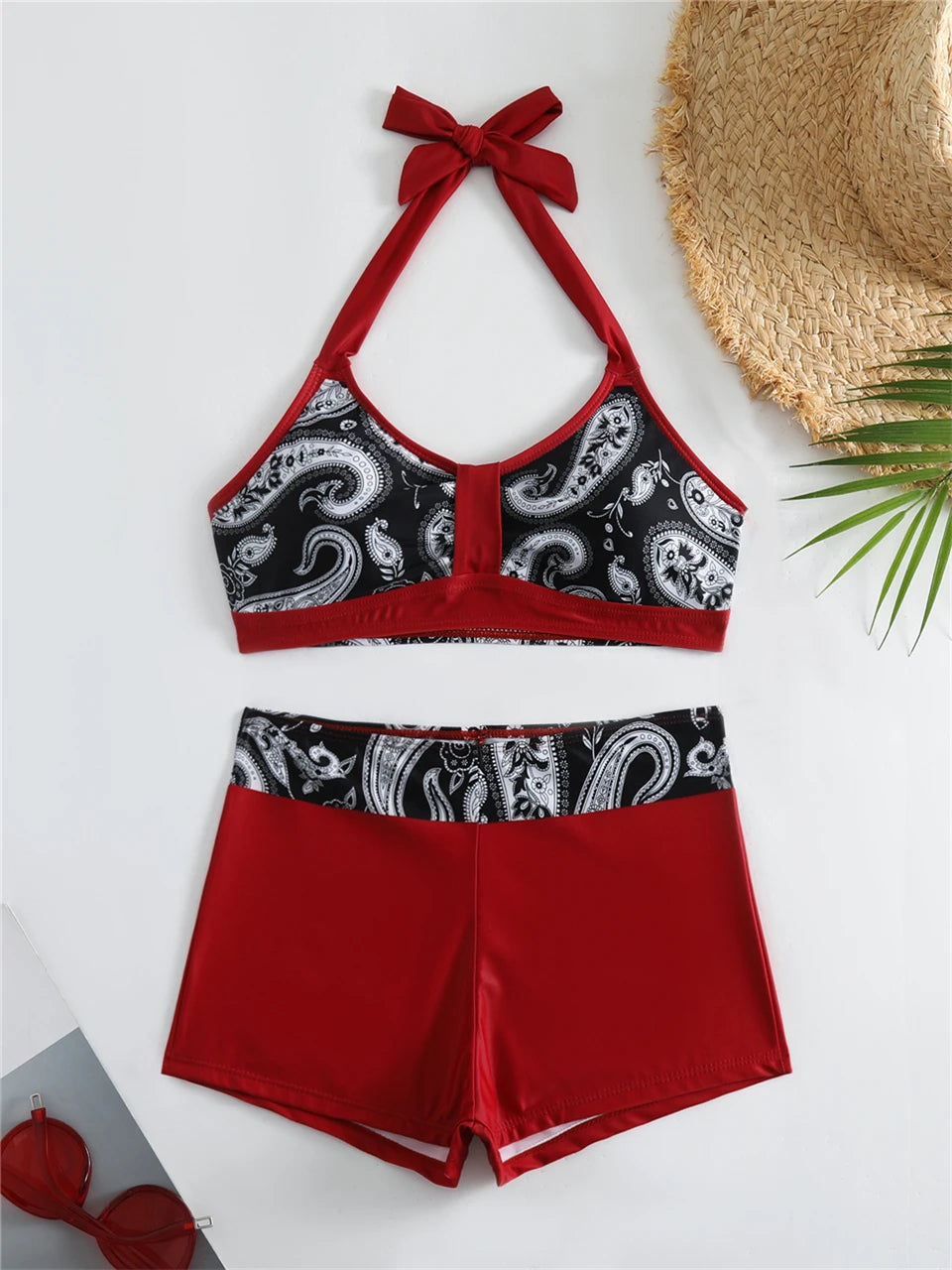 Tidesmit red and black paisley high-waist bikini set featuring a halter-tie top and sporty boy-short bottoms.