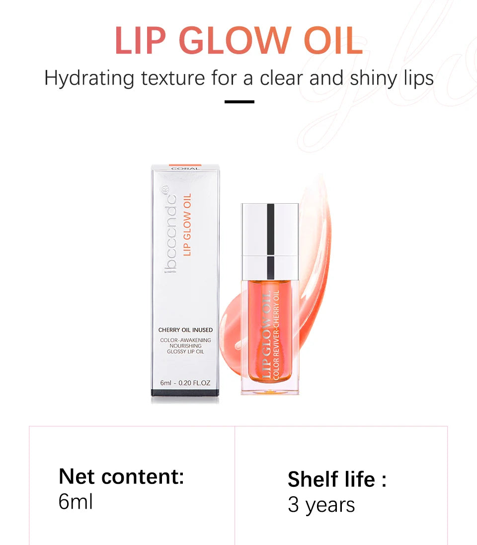 Coral moisturizing lip glow oil with a glossy, hydrating jelly texture in a clear tube with packaging box.