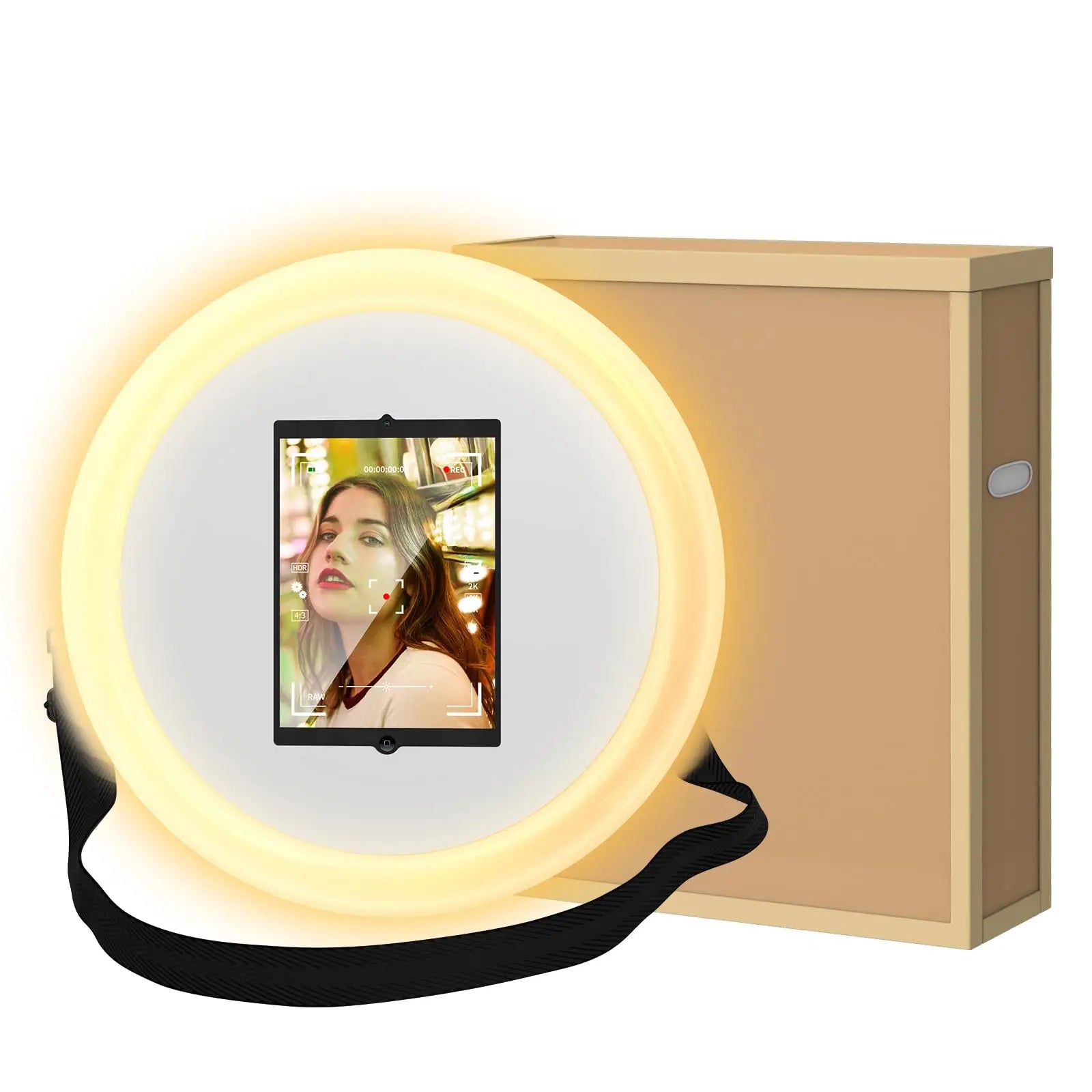 Round portable photo booth ring light with center screen and black carry strap, next to a beige protective case.