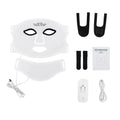 White flexible silicone LED face and neck mask kit with controller, straps, manual, and charging cable on white.