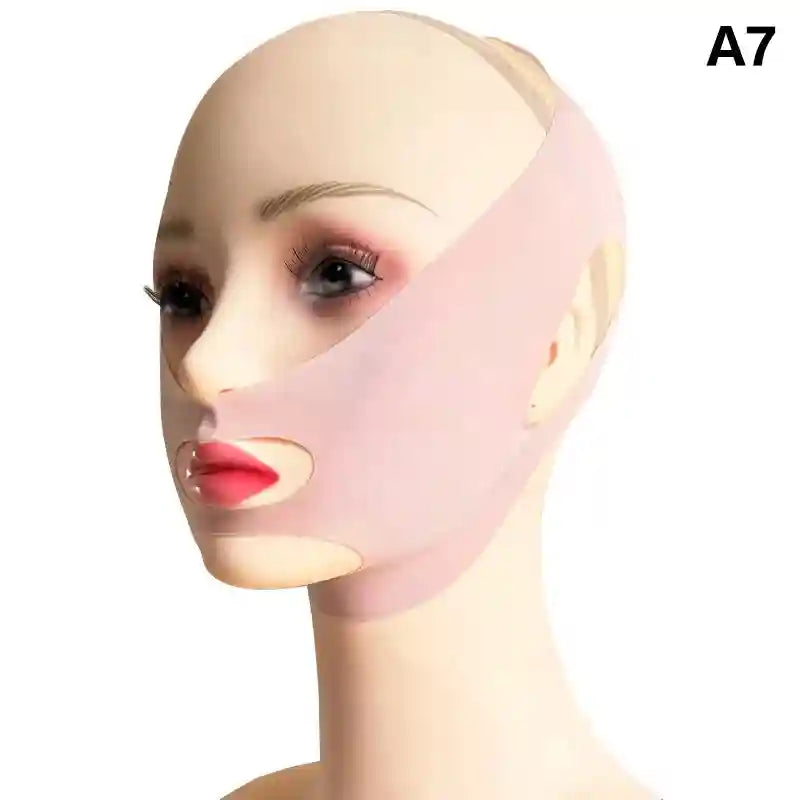 A light pink, fabric V-line face slimming bandage on a mannequin head, featuring cutouts for the mouth and ears.