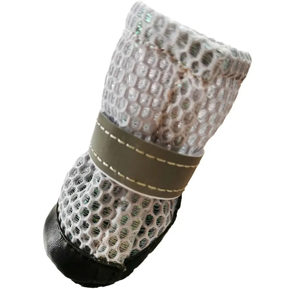 Breathable, reflective mesh dog shoes with anti-slip soles to protect pet paws during outdoor walks. 4-piece set.