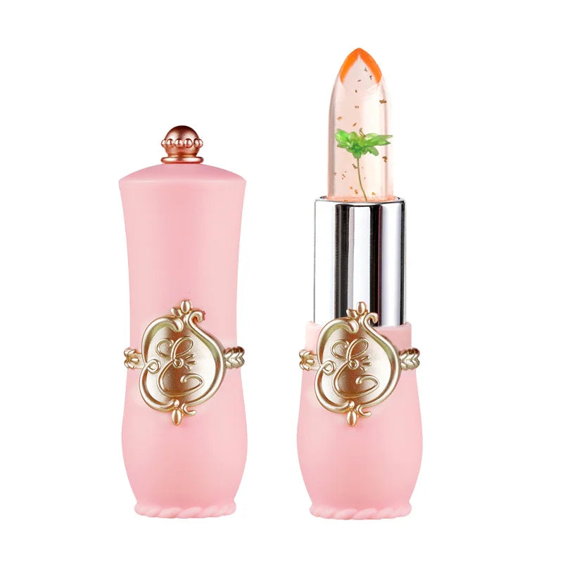 Crystal flower jelly lipstick with moisturizing balm, clear texture, gold flakes, and real flower inside a pink tube.