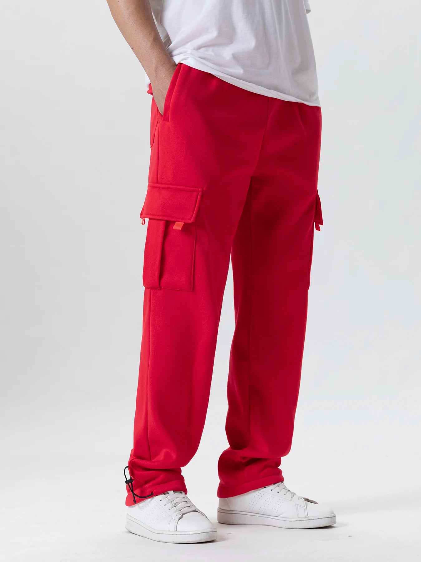 Tidesmit men's red loose-fit straight cargo sweatpants with side flap pockets and adjustable drawstring cuffs.