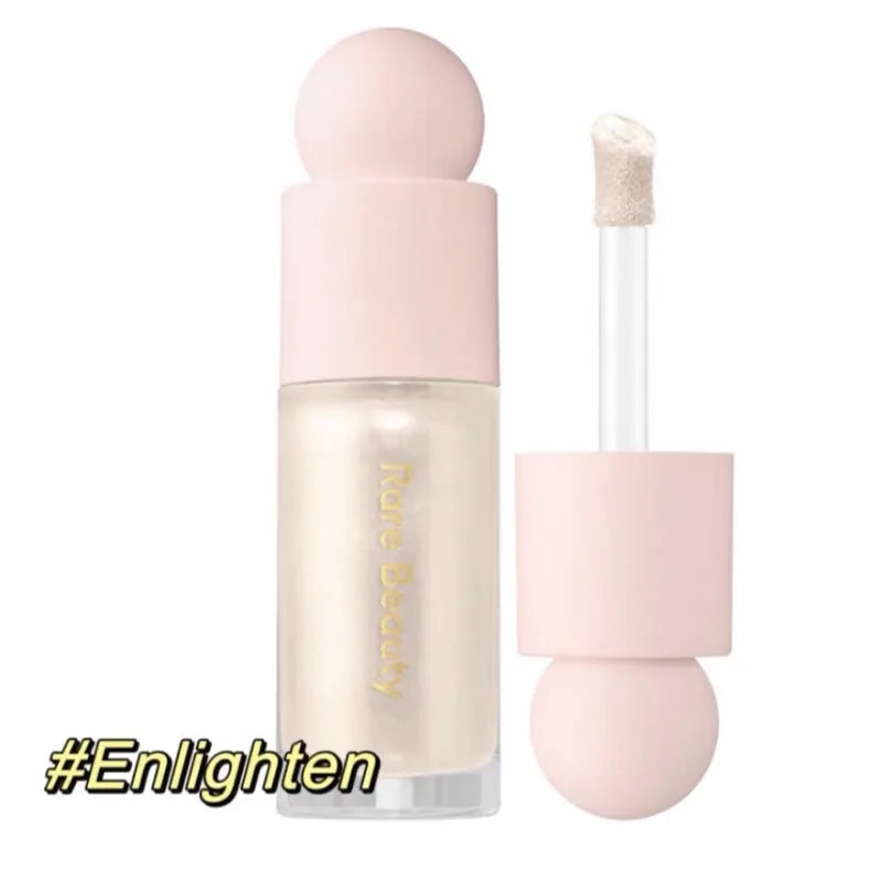 Rare Beauty liquid highlighter in Enlighten: a shimmering, champagne-toned long-lasting glow stick for lips and face.