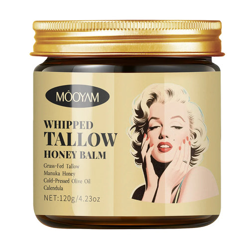 Whipped tallow honey balm jar with gold lid and cream label