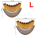 Two crescent-shaped facial brushes with wood-patterned handles and dense, soft, golden-brown bristles, sized 7.5x5.1cm.