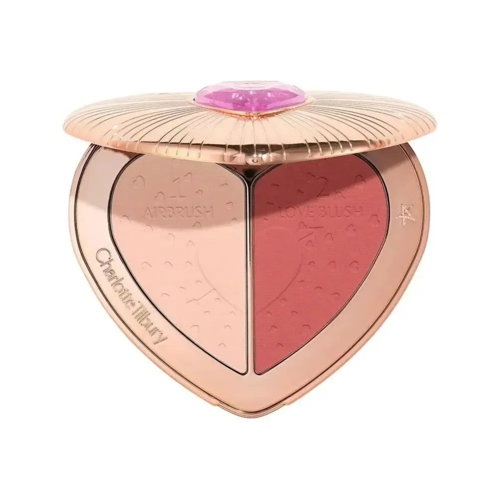 Charlotte Tilbury heart-shaped dual-tone powder blush compact in rose gold case with soft matte finish.