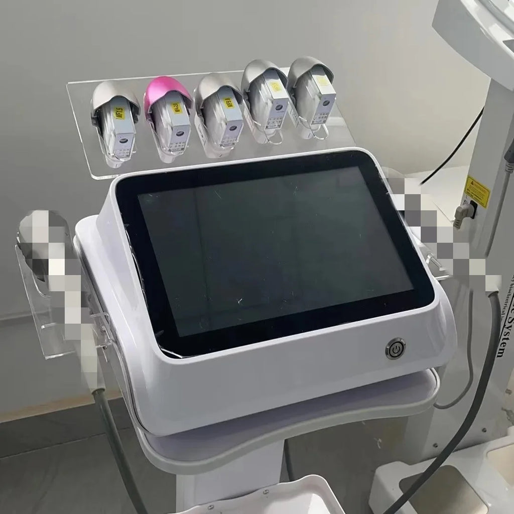 Professional 7D beauty machine with a white console, touchscreen, and five specialized treatment handpiece cartridges.