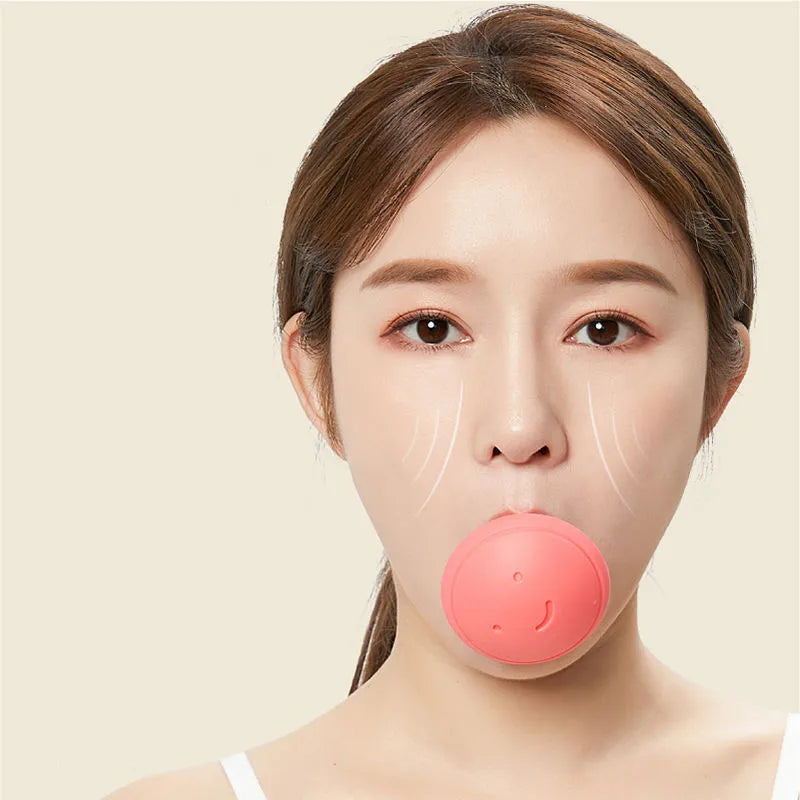 A person holding a round, pink silicone facial exercise tool in their mouth with light lines illustrating face lifting.