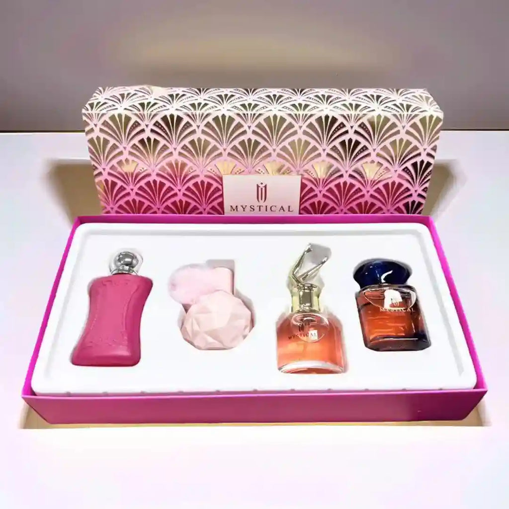 MYSTICAL unisex perfume gift set with 4 mini fragrance bottles in a decorative pink box; ideal luxury birthday gift.