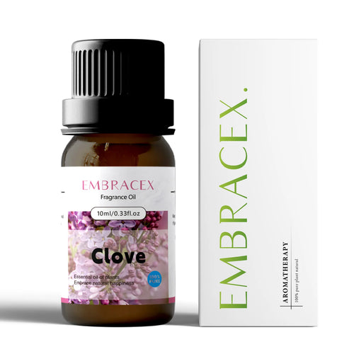 Amber bottle of Clove essential oil for aromatherapy and natural wellness, shown with white product packaging.