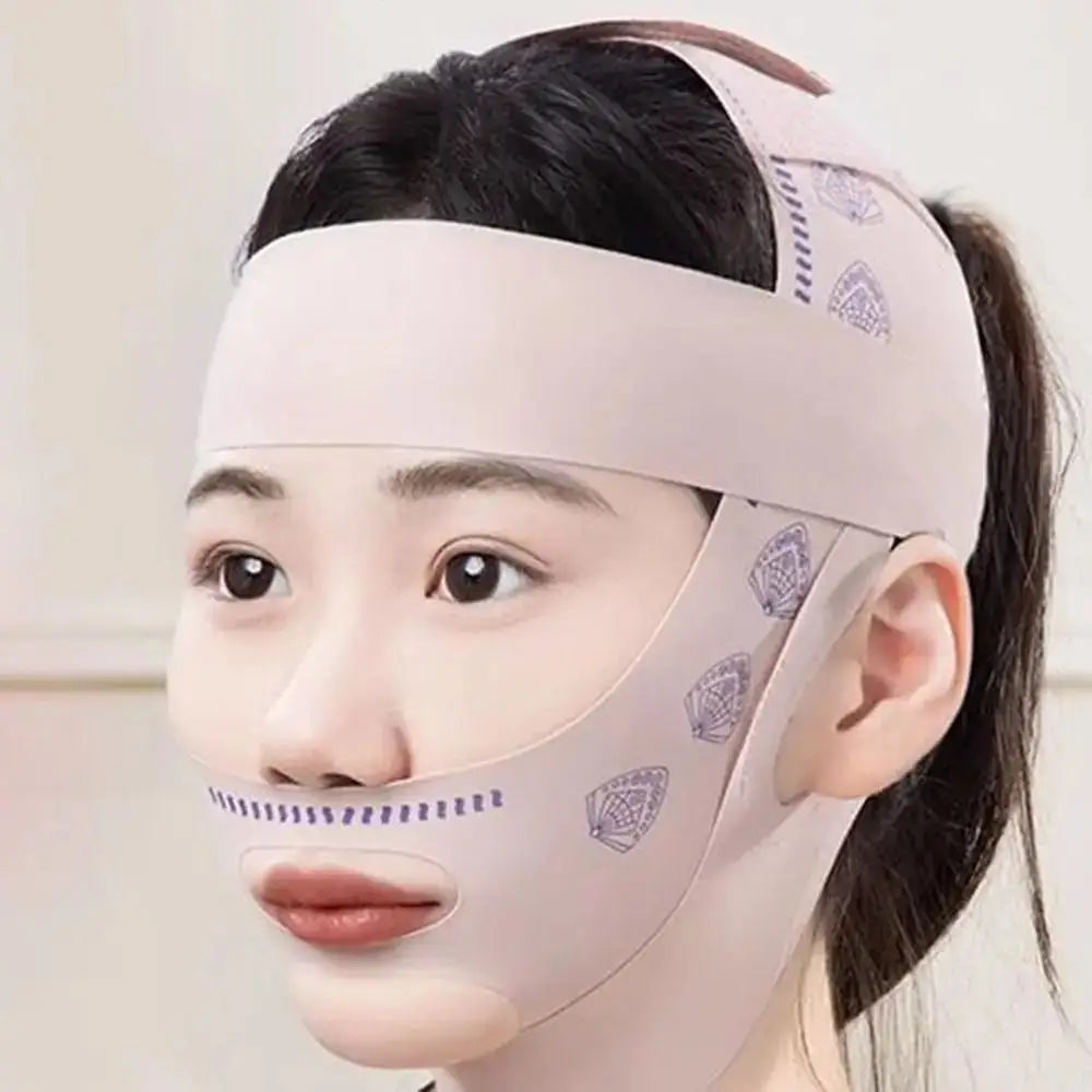 A woman wears a beige elastic face-sculpting strap with purple decorative patterns around her chin and head.