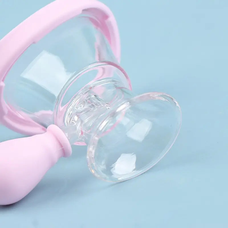 Reusable soft pink silicone eye wash cup for gentle eye cleansing, flushing, and rinsing on a light blue background.