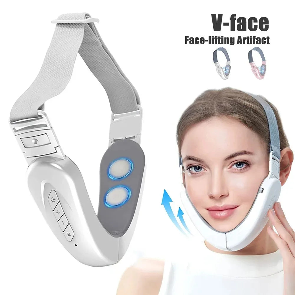 White V-face lifting device with adjustable strap, massage nodes, and control buttons, shown on a woman's face.