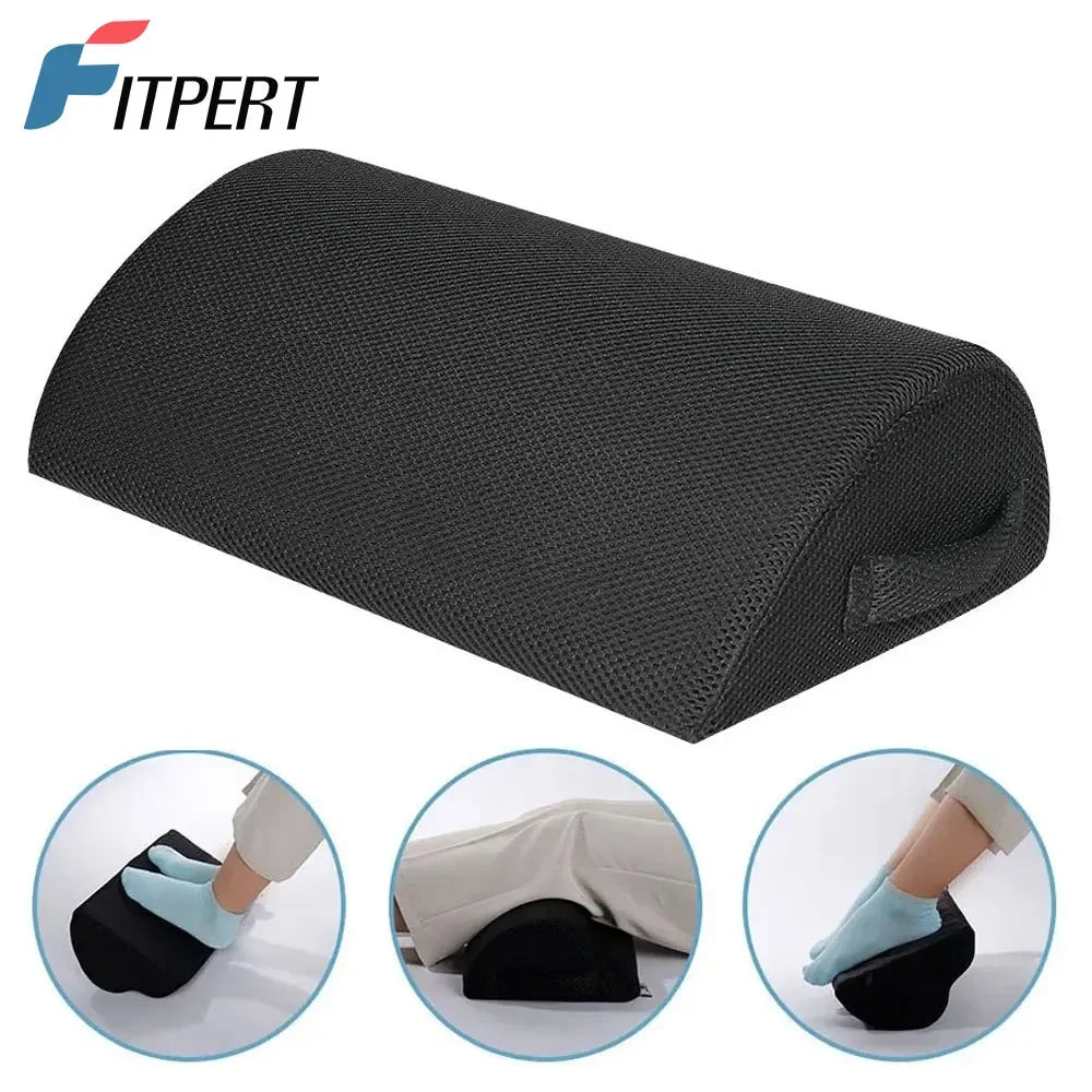 Black half-cylinder memory foam foot rest for under desk with breathable cover and carry handle for office or travel.