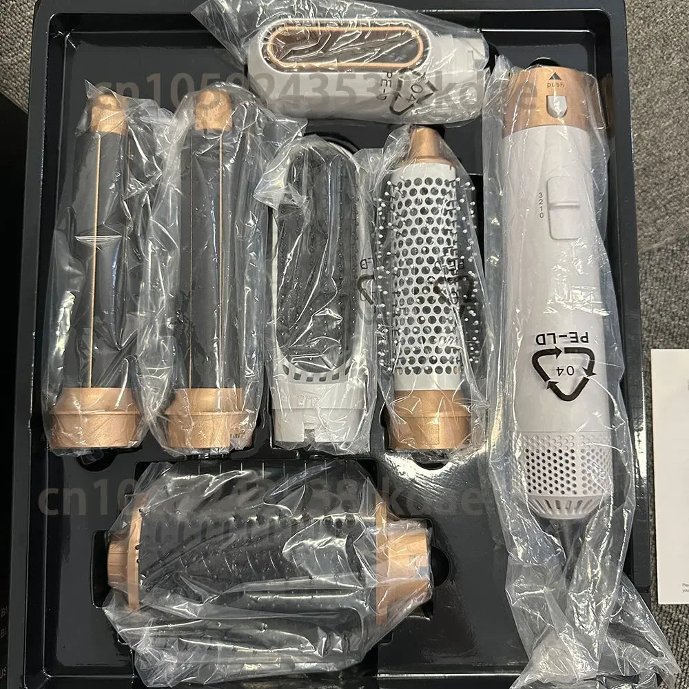 6-in-1 gold and white hair dryer brush set with styling attachments for professional curling and straightening at home.