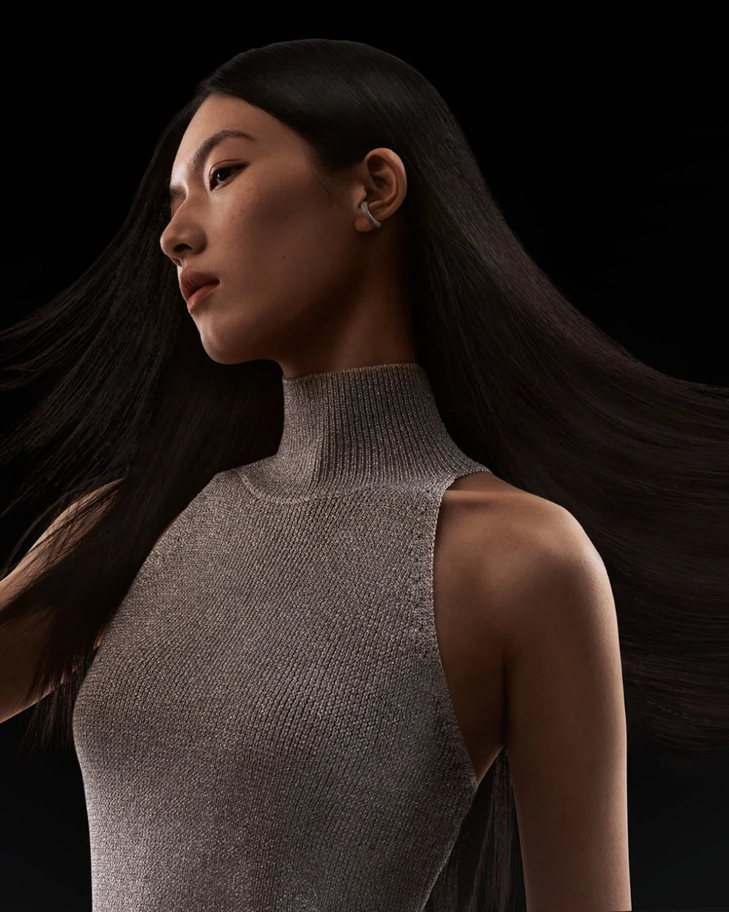 Model with sleek, healthy hair blown by MIJIA High-Speed Hair Dryer Pro for shiny, professional styling results.