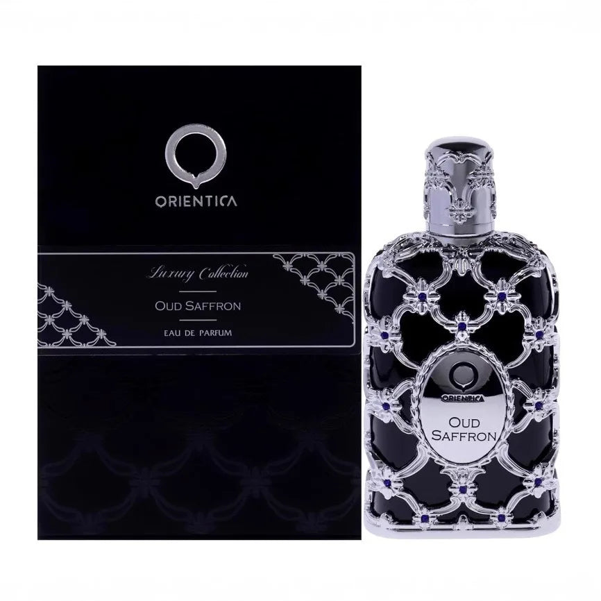 Orientica Oud Saffron EDP 100ml: Luxurious unisex perfume in an ornate, silver-filigree glass bottle with rich scent.