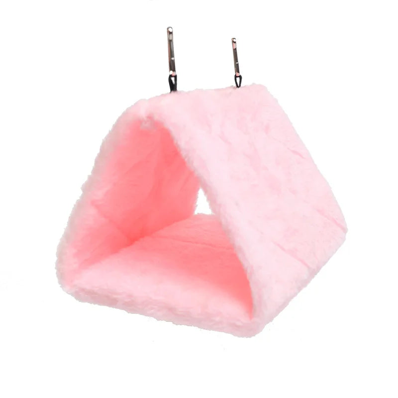 Soft pink plush hanging hammock for hamsters, parrots, and birds. Warm, cozy winter cage nest for small pets.