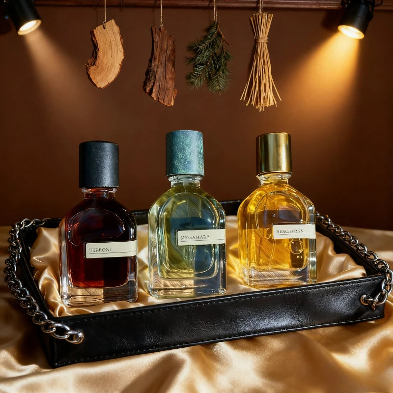 Orto Parisi unisex perfume set: Terroni, Megamare, Bergamask. Woody, amber, earthy 50ml glass bottles on a leather tray.