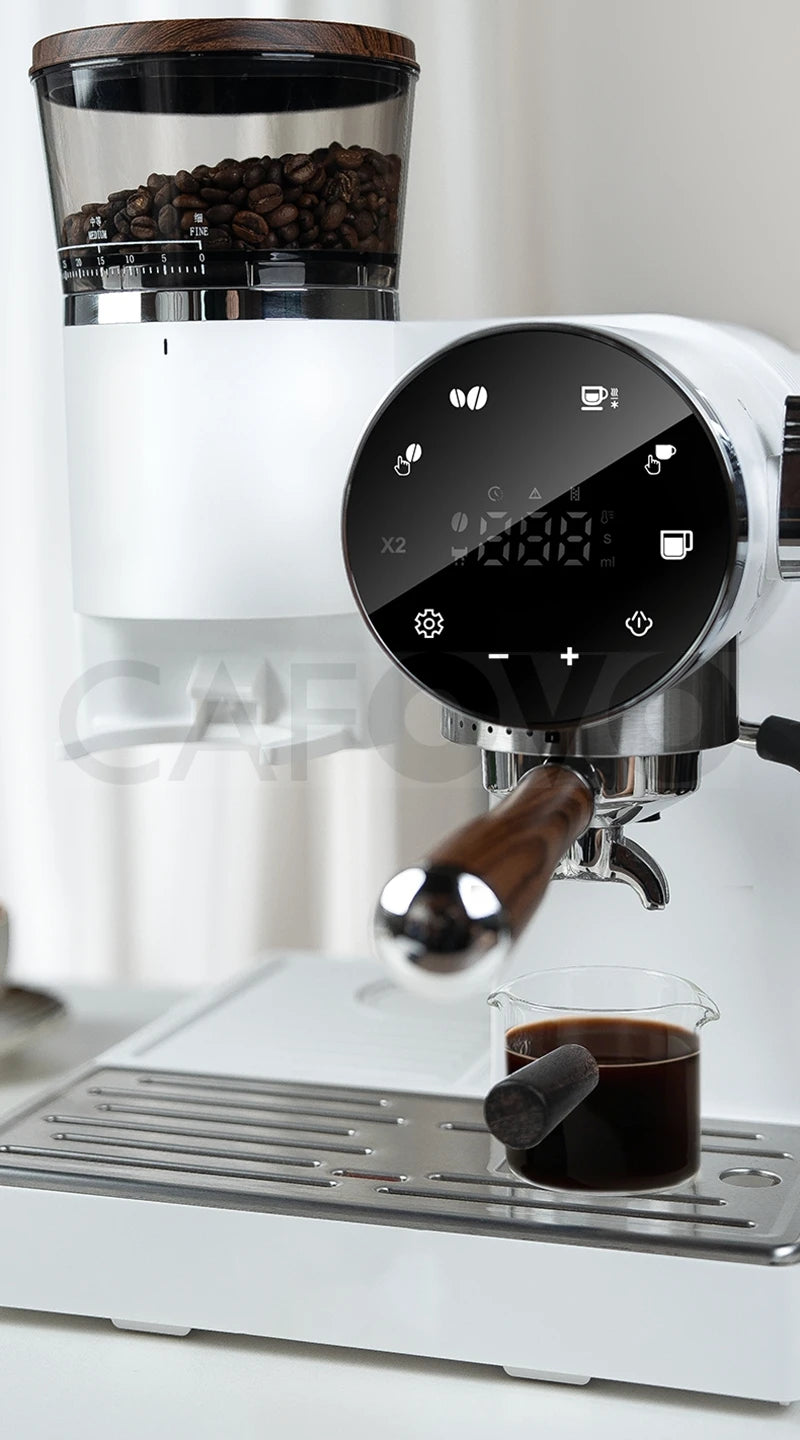 Cafovo white espresso machine with integrated bean grinder, digital touchscreen, and wooden portafilter handle.
