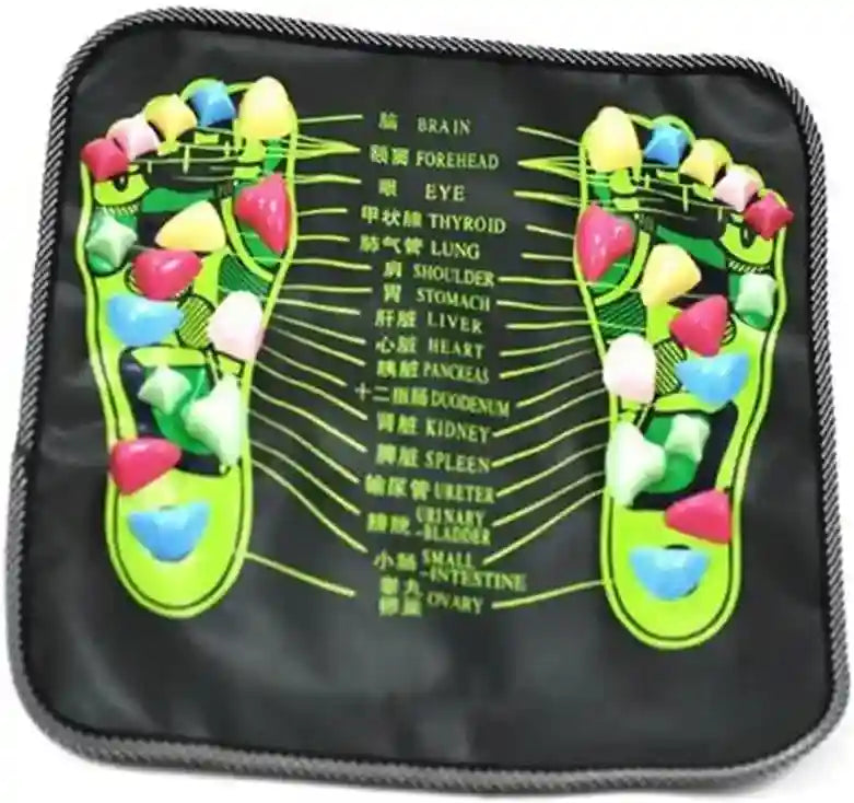 Black foot reflexology acupressure mat with colorful stone-like massage nodes and foot chart for pain relief.