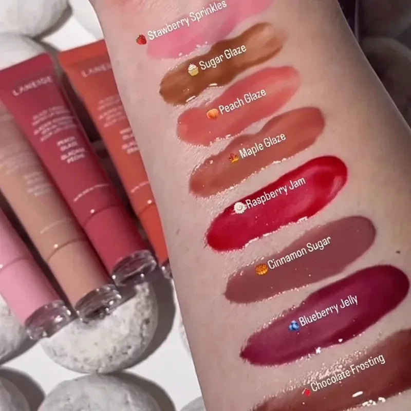 Laneige lip gloss swatches in various shades on arm, showcasing shiny, moisturizing, pigmented, and buttery textures.