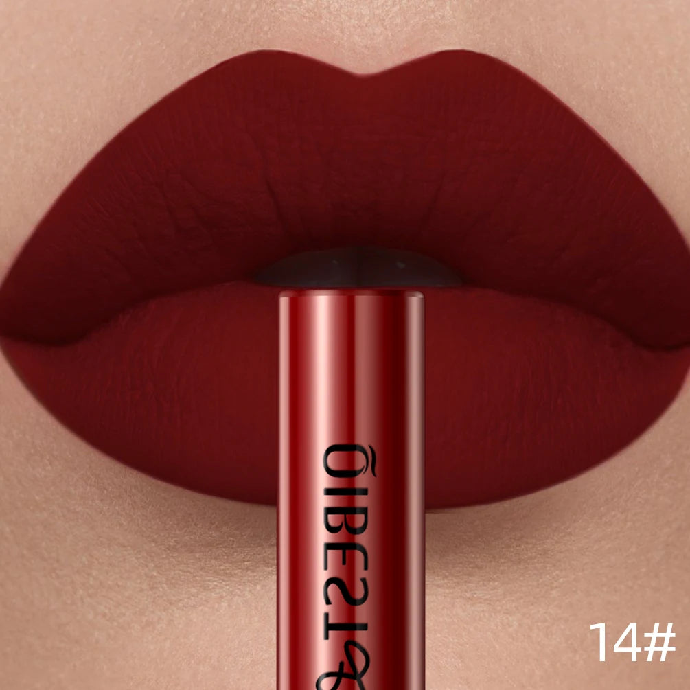 Matte liquid lipstick in deep red velvet shade. Long-lasting, waterproof, nonstick, sexy dark red lip makeup stain.