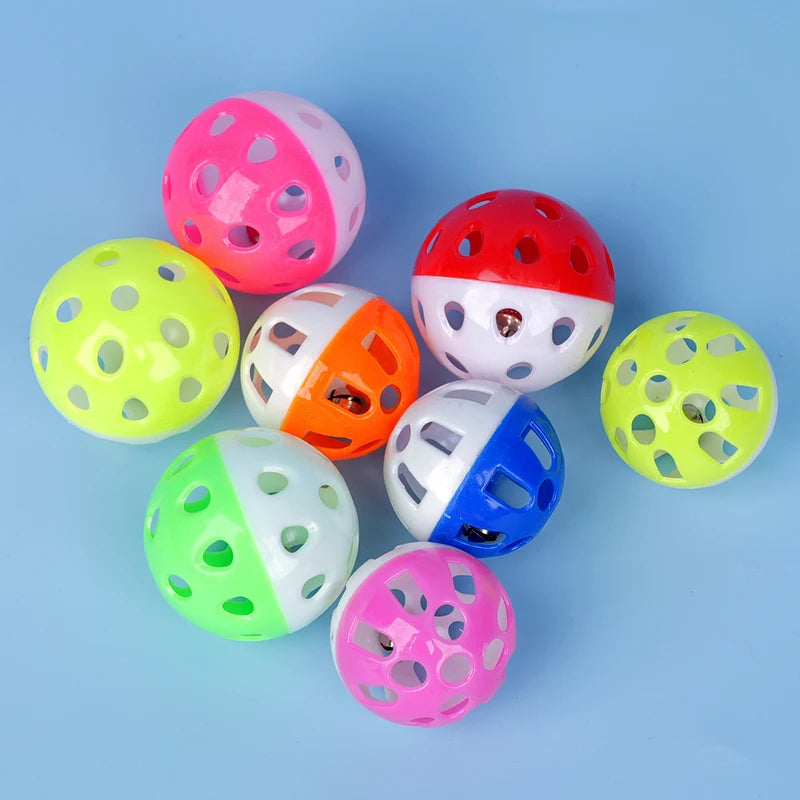 10pcs colorful hollow plastic bell balls for pet birds, parakeets, and parrots to chew, play, and exercise in cages.