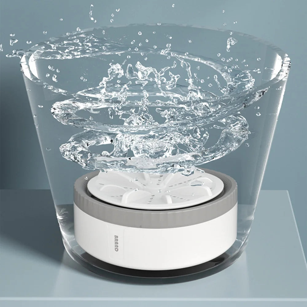 Tidesmit portable mini USB ultrasonic turbo washing machine showing remote control feature for travel and kitchen use