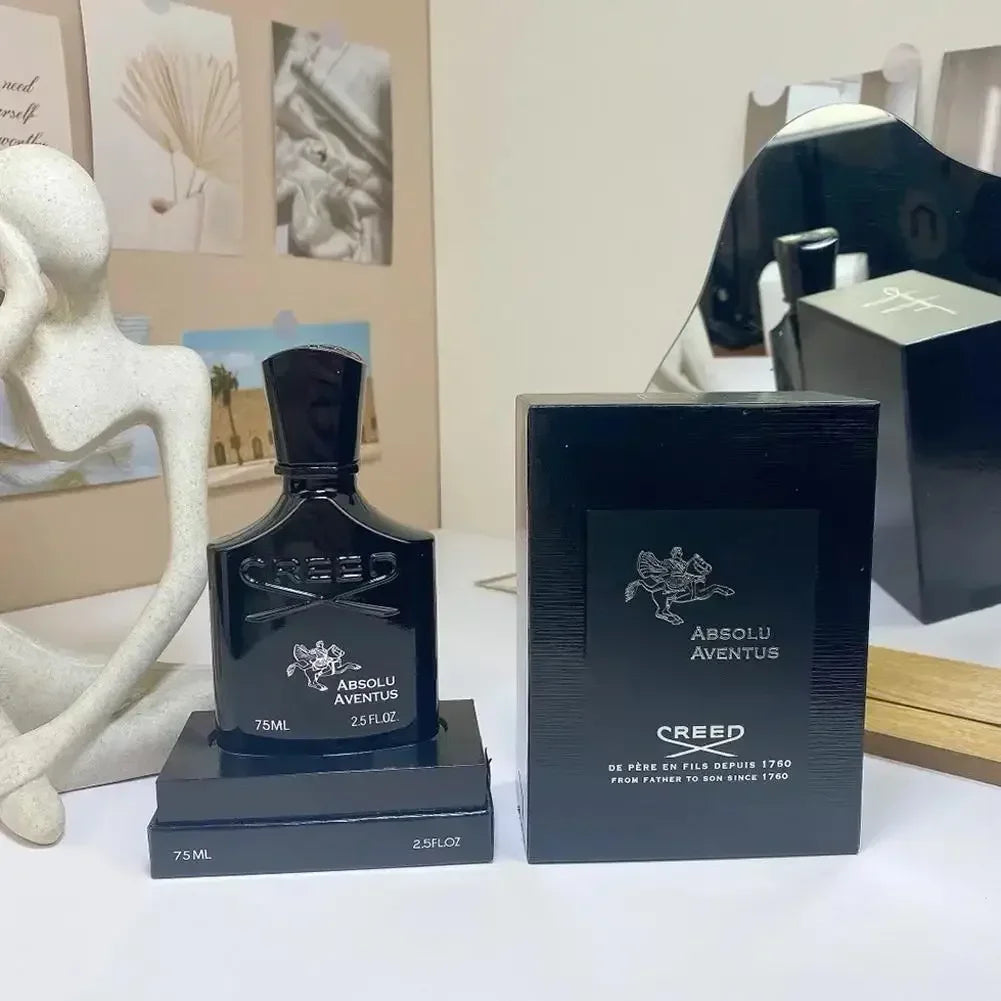 Creed Absolu Aventus EDP: Black 75ml glass spray bottle and box, luxury unisex fragrance, iconic Creed horse logo.