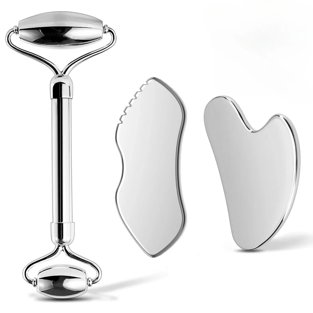 Stainless steel facial roller and two unique gua sha massage tools with a reflective, metallic silver finish.