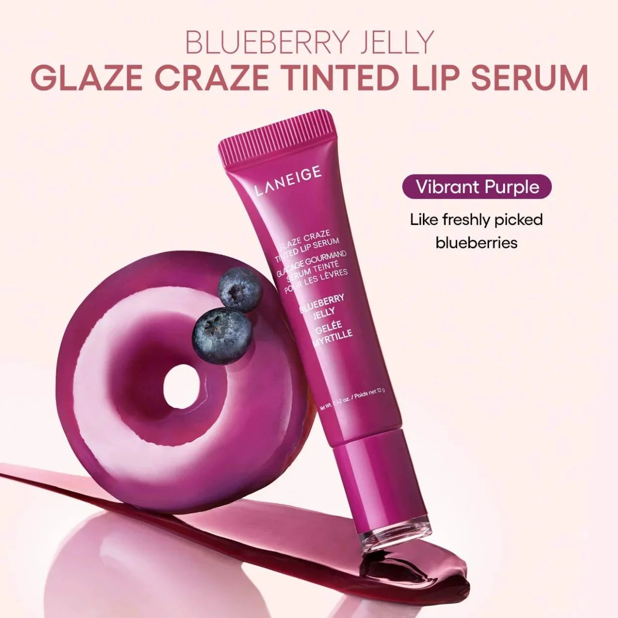 Laneige Blueberry Jelly Glaze Craze Tinted Lip Serum in vibrant purple, shown with a glossy donut and fresh blueberries.