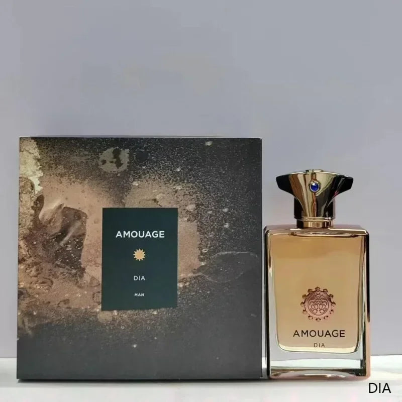 Amouage Dia Man EDP: 100ml woody floral fragrance in a luxury gold rectangular bottle with a jeweled cap.