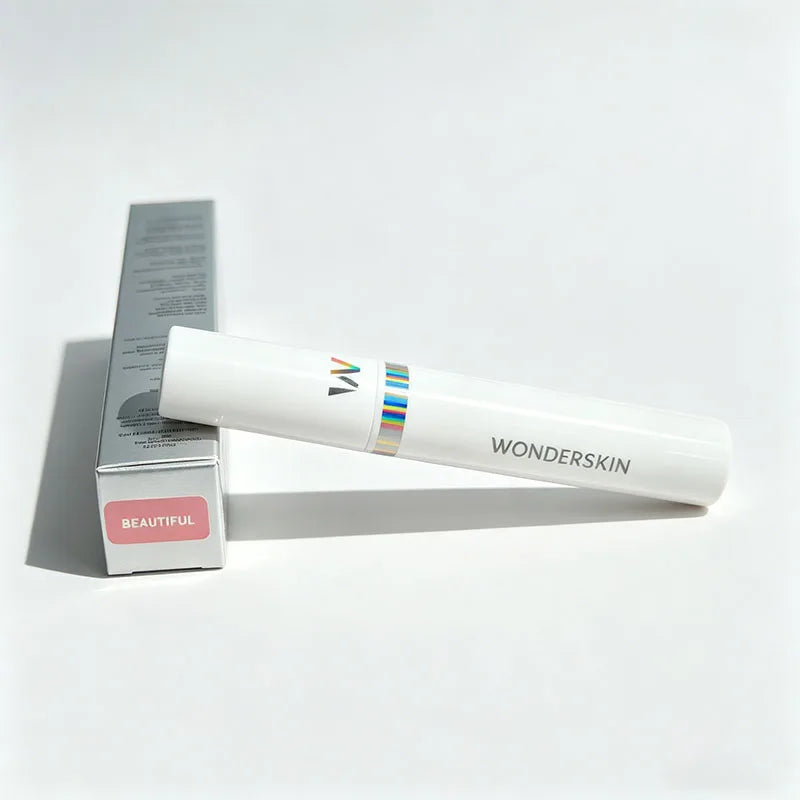 Wonderskin peel-off lip stain in Beautiful pink. Long-lasting, waterproof lip makeup in white tube and silver box.