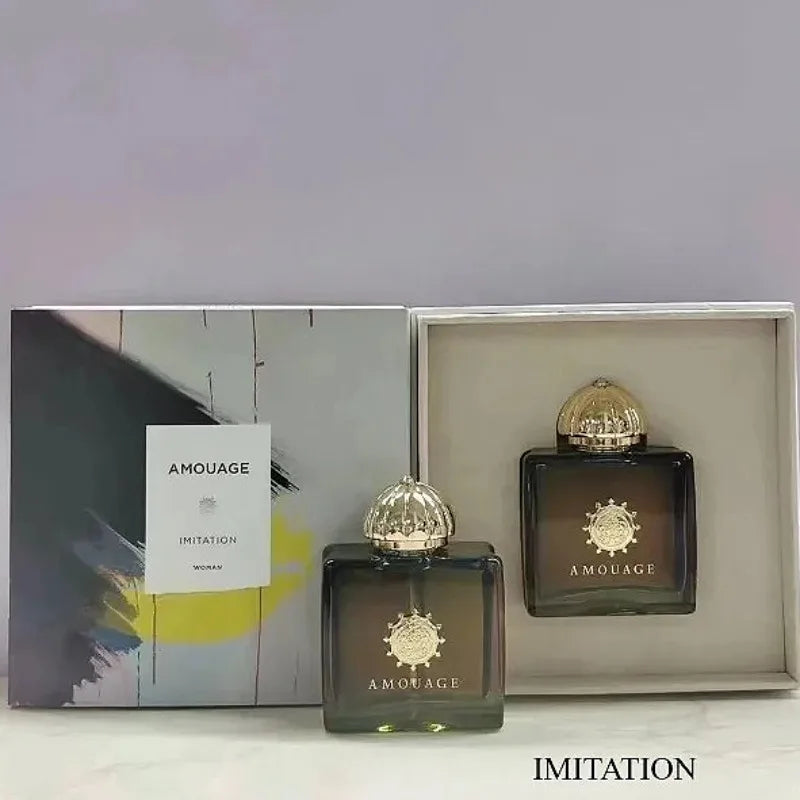Amouage Imitation Woman 100ml perfume set, luxury floral oriental woody musk fragrance in square glass bottle with gold.