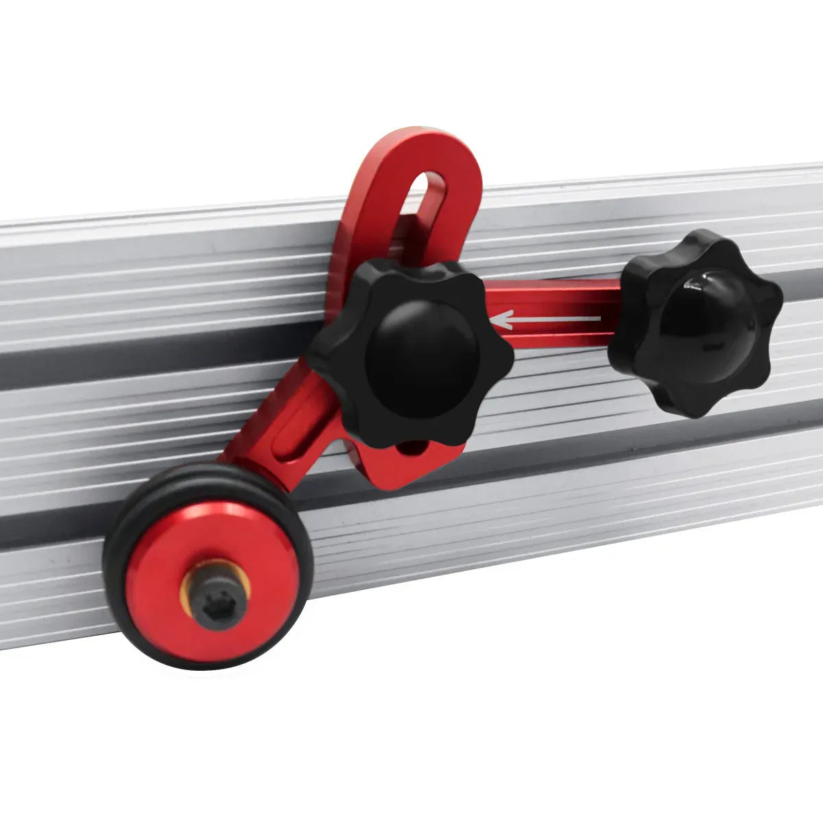 Pair of red stock guide rollers with black grip knobs on an aluminum rail