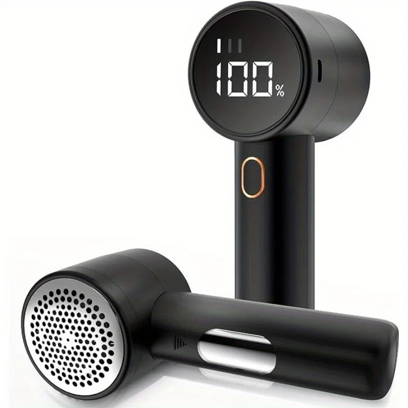 Black rechargeable fabric lint remover with round LED display showing 100% charge