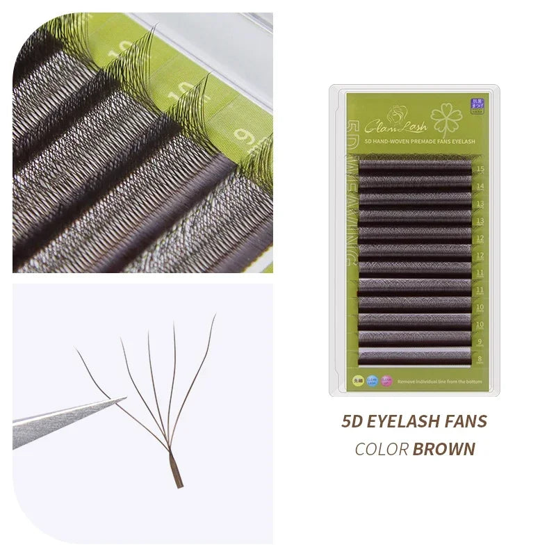 Brown 5D premade eyelash extension fans on a tray with varying lengths, held by tweezers for application.