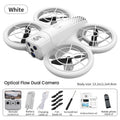 White quadcopter drone with four propeller guards, dual cameras, and included remote, battery, and accessories.